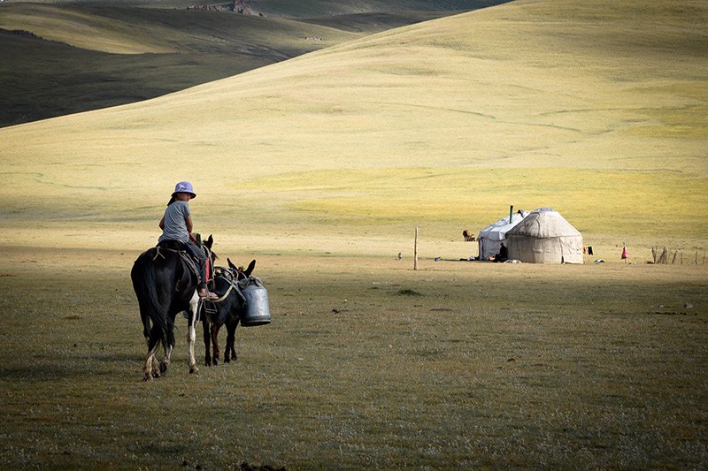 Travel through lush valleys of the Wakhan valley bordering Afghanistan