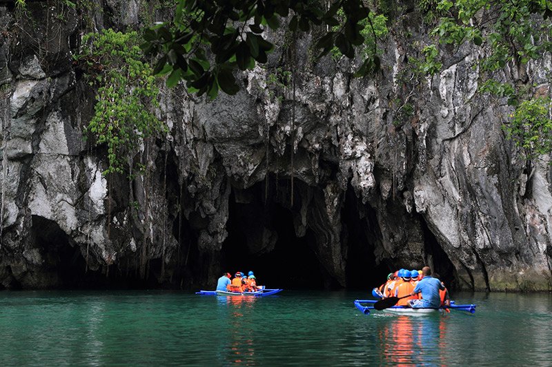 Savour the cool temperatures of the Alpine village of Sagada with its ancient burial caves and hanging coffins
