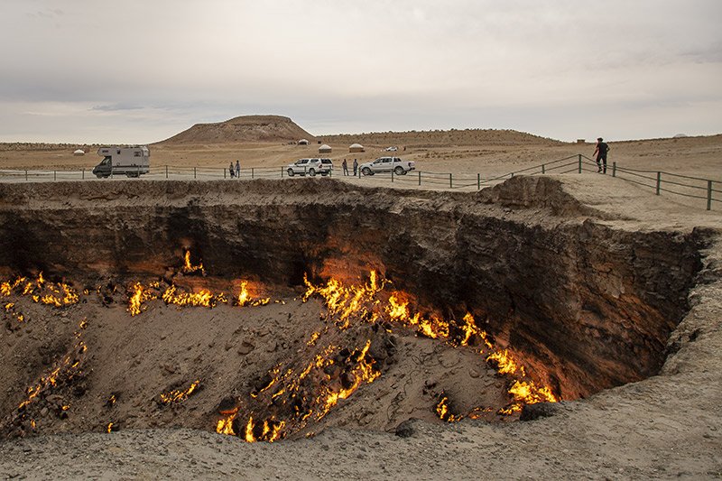 Watch the fires light up the night sky while camping at the Darvaza Gas Craters