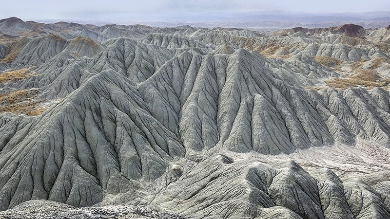 Marvel at the striking rock formations of the Yangikala Canyon