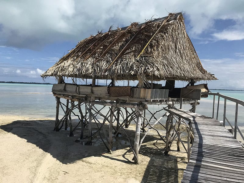 Stay in a traditional buia on Kiribati and experience the laid-back island lifestyle
