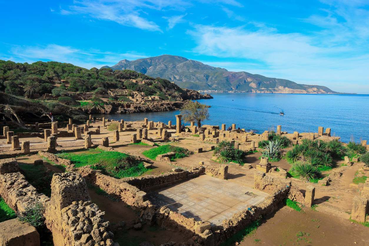 Explore the ancient Roman ruins of Tipasa set beside the Mediterranean.