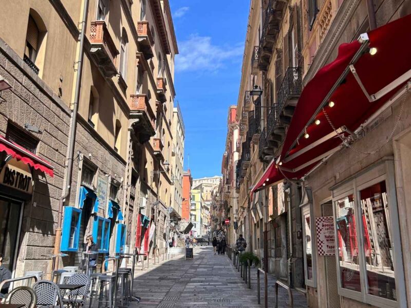 Cagliari/Sardinian street with bistrot and red awnings
